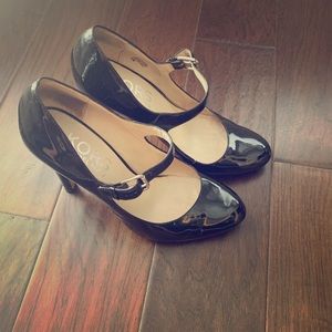 Michael Kors black patent leather Mary Jane pumps